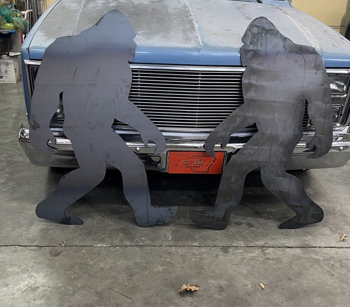 Small view of two plasma cut Bigfoot metal silhouettes