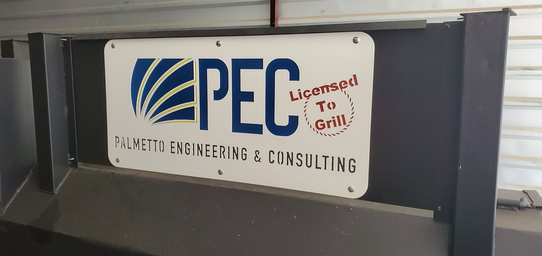 Large view of installed and painted PEC business sign