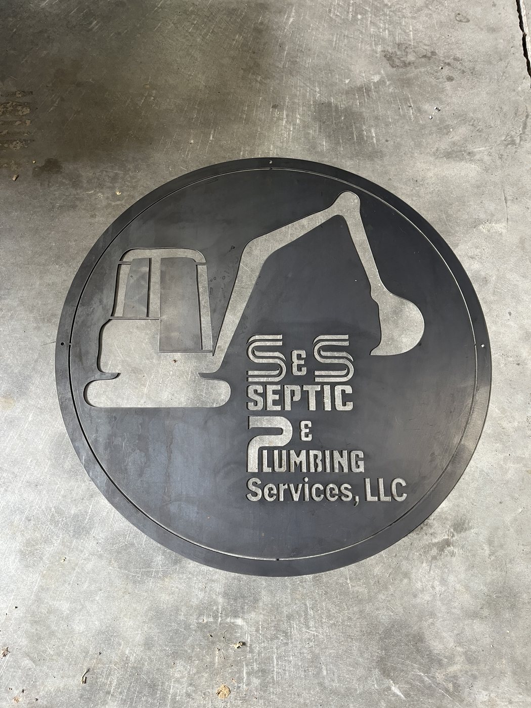 Large view of septic and plumbing custom plasma cut business sign