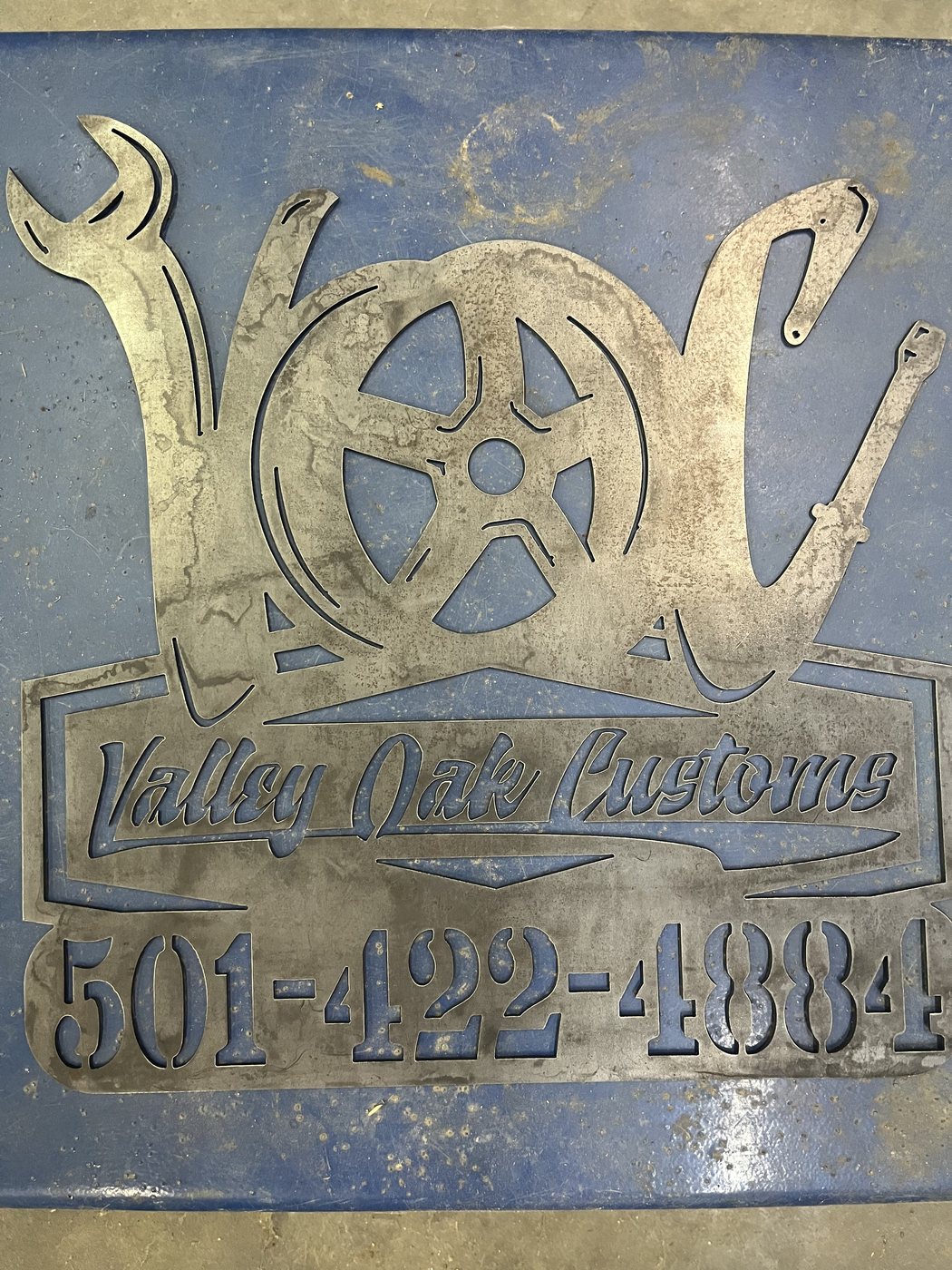 Large view of custom plasma cut business sign